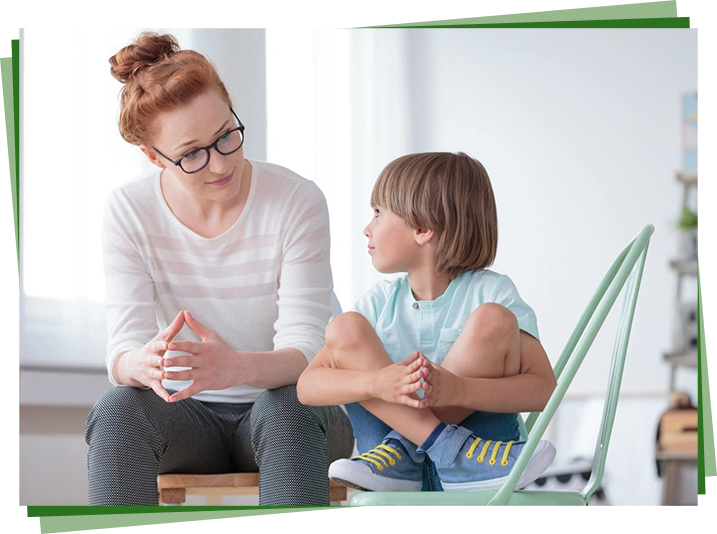 A woman and child sitting on the floor